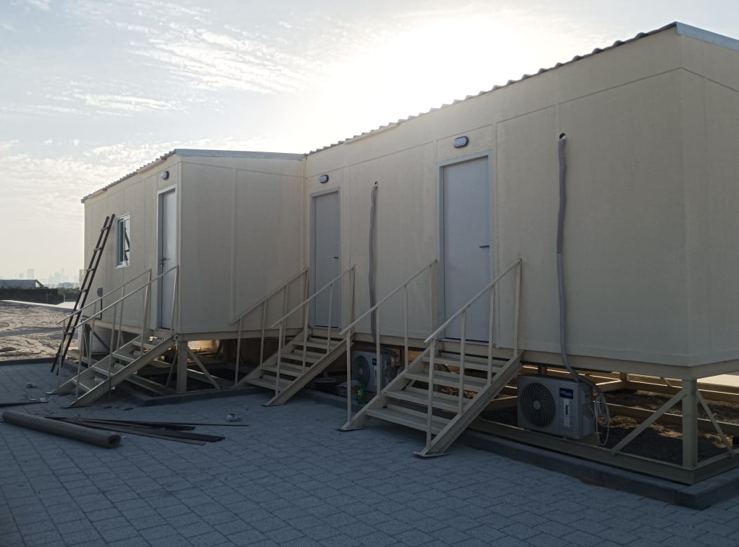 a building with stairs and doors