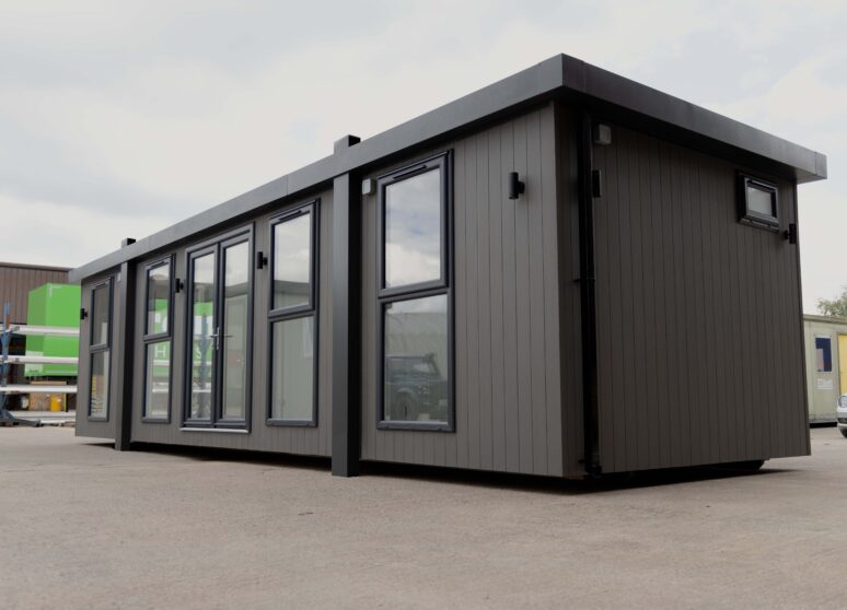 a white container with a door and windows